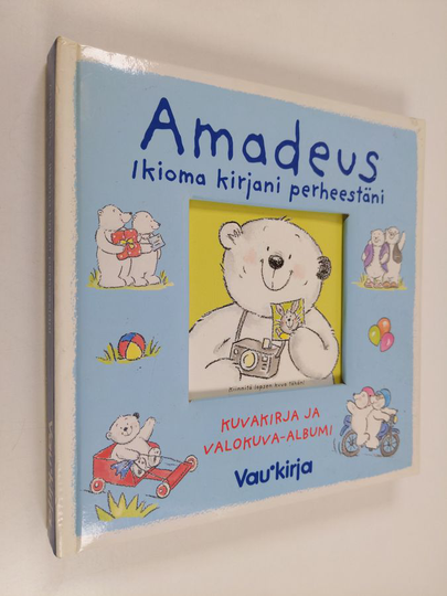 Amadeus : Ikioma kirjani perheestäni : omilla kuvilla täytettävä luukkukirja