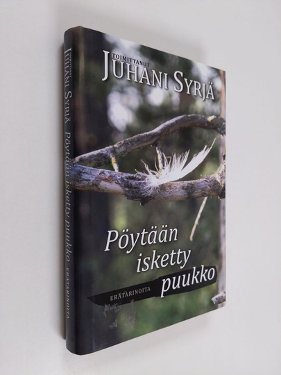 Juhani Syrjä : Pöytään isketty puukko : erätarinoita