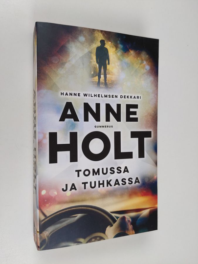 Anne Holt : Tomussa ja tuhkassa