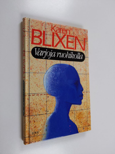 Karen Blixen : Varjoja ruohikolla