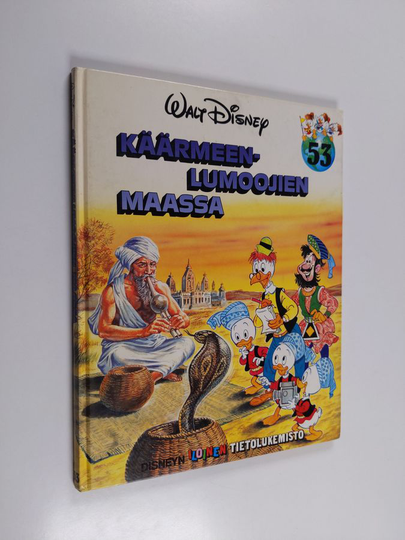 Walt Disney : Käärmeenlumoojien maassa
